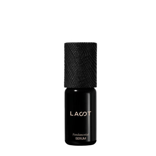Black Skin Repair Serum bottle with 'LAST' branding on a white background