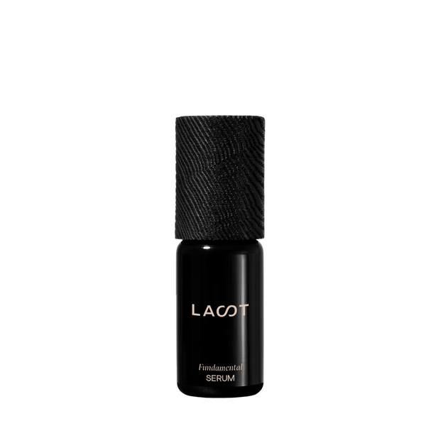 Black Skin Repair Serum bottle with 'LAST' branding on a white background