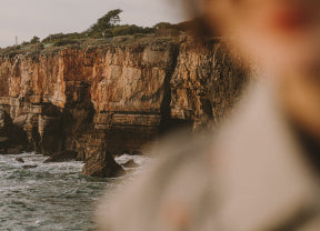 Cliffside with ocean view and blurred foreground