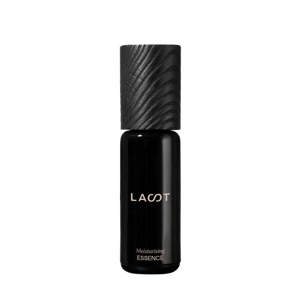 Black LAST Moisturizing Essence bottle on a white background